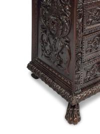 An Italian Renaissance Style Mahogany Chest of Drawers