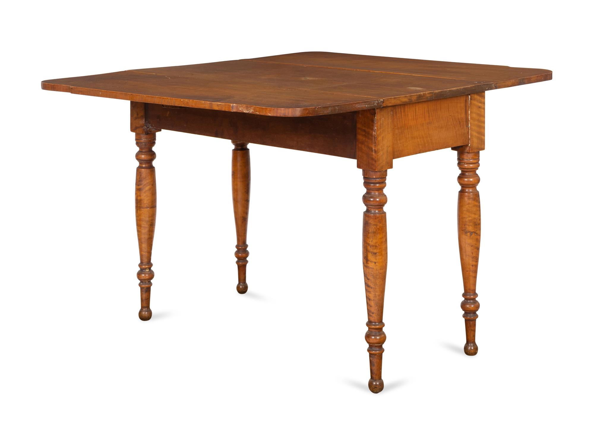 A Classical Tiger Maple Drop-Leaf Table