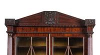 A Regency Carved and Figured Mahogany Secretary Bookcase