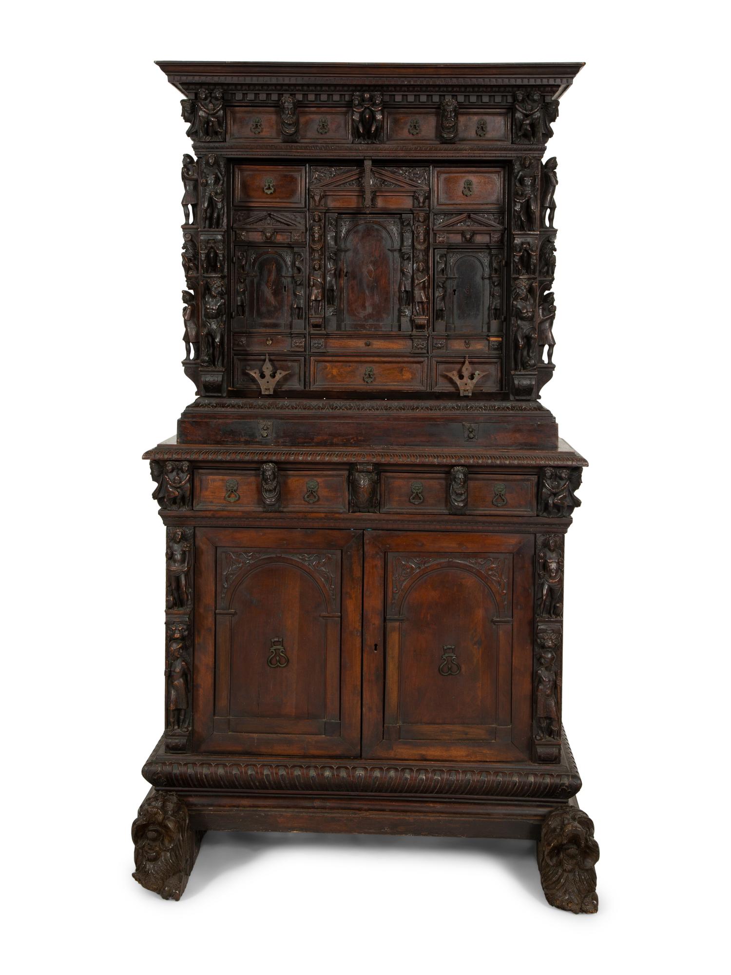 A Continental Baroque Walnut Cabinet