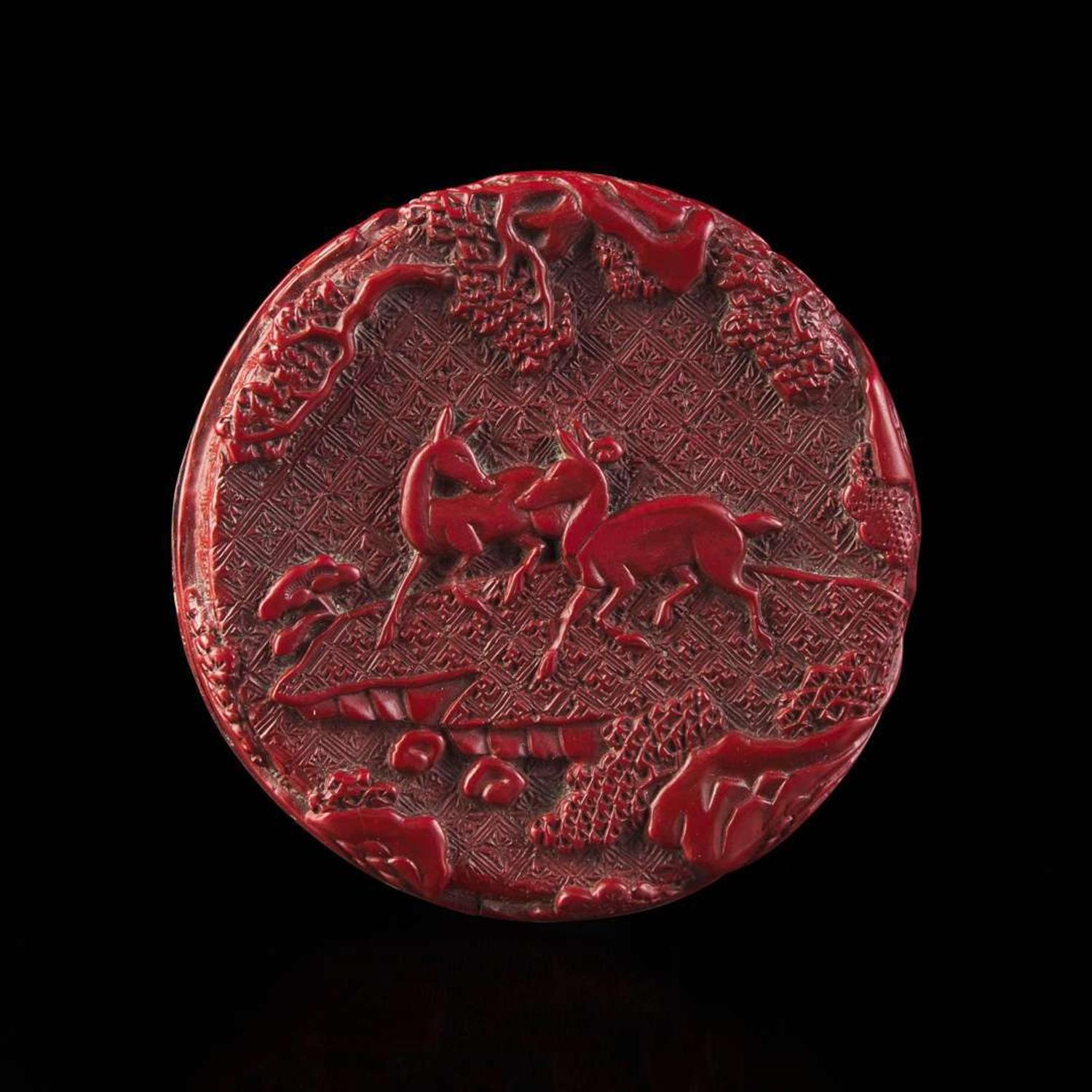 An associated pair of Chinese carved cinnabar lacquer dishes, and a small circular box 大漆 盘子或一对及一小盖盒