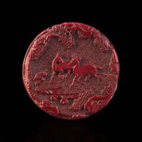 An associated pair of Chinese carved cinnabar lacquer dishes, and a small circular box 大漆 盘子或一对及一小盖盒