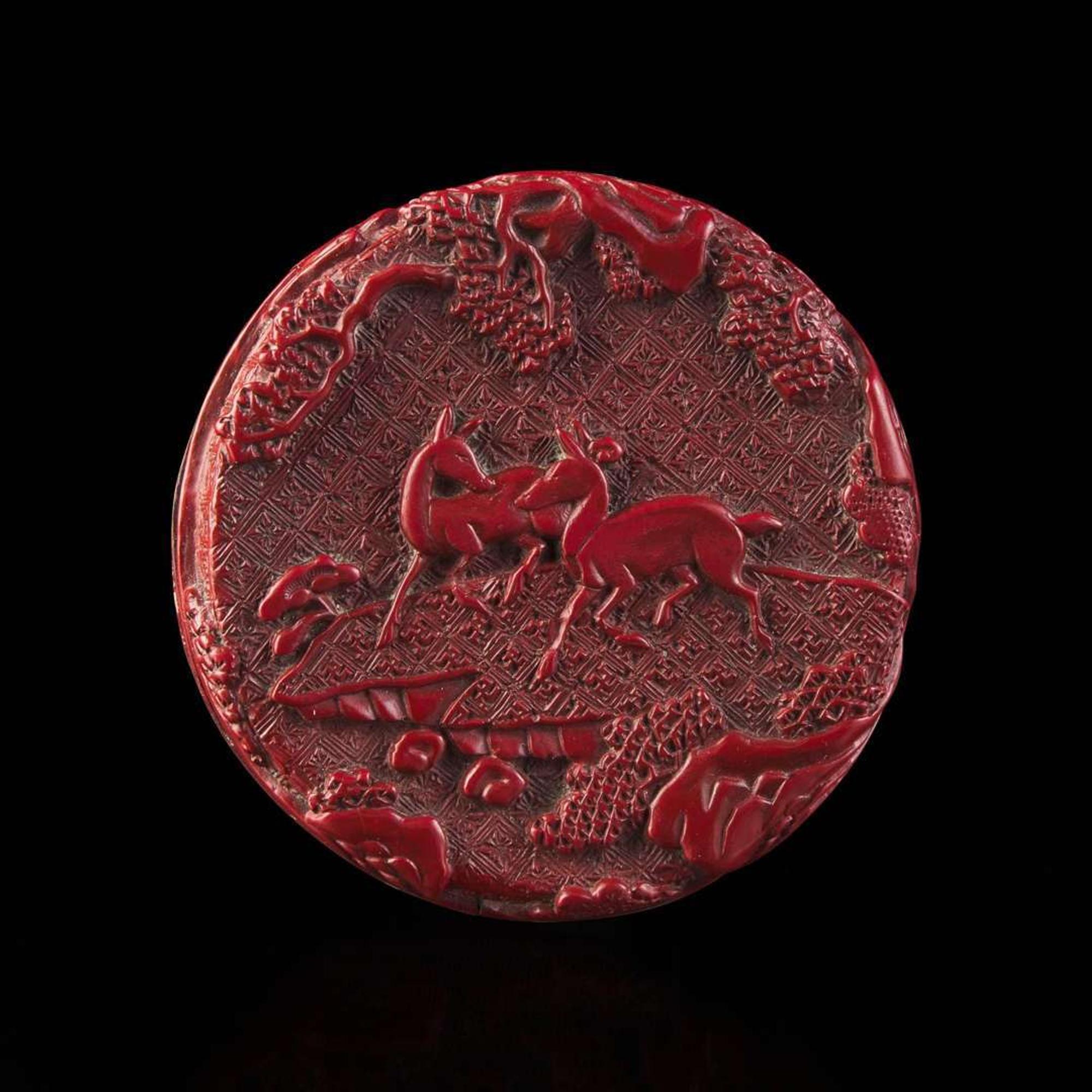 An associated pair of Chinese carved cinnabar lacquer dishes, and a small circular box 大漆 盘子或一对及一小盖盒