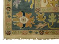 An Oushak Wool Rug