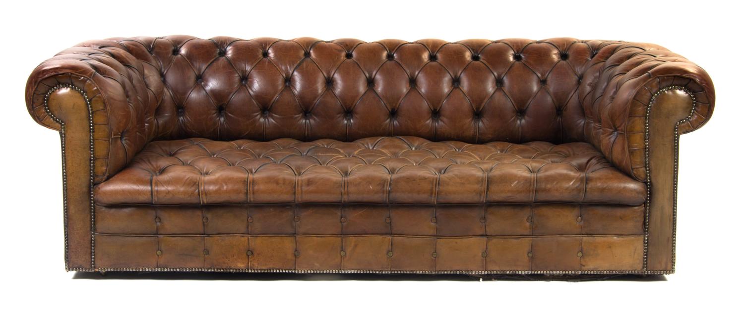 An Edwardian Style Leather Upholstered Chesterfield Sofa, Width 86 inches.