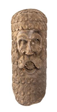 An Italian Carved Wood Mask, Height 25 1/2 inches.
