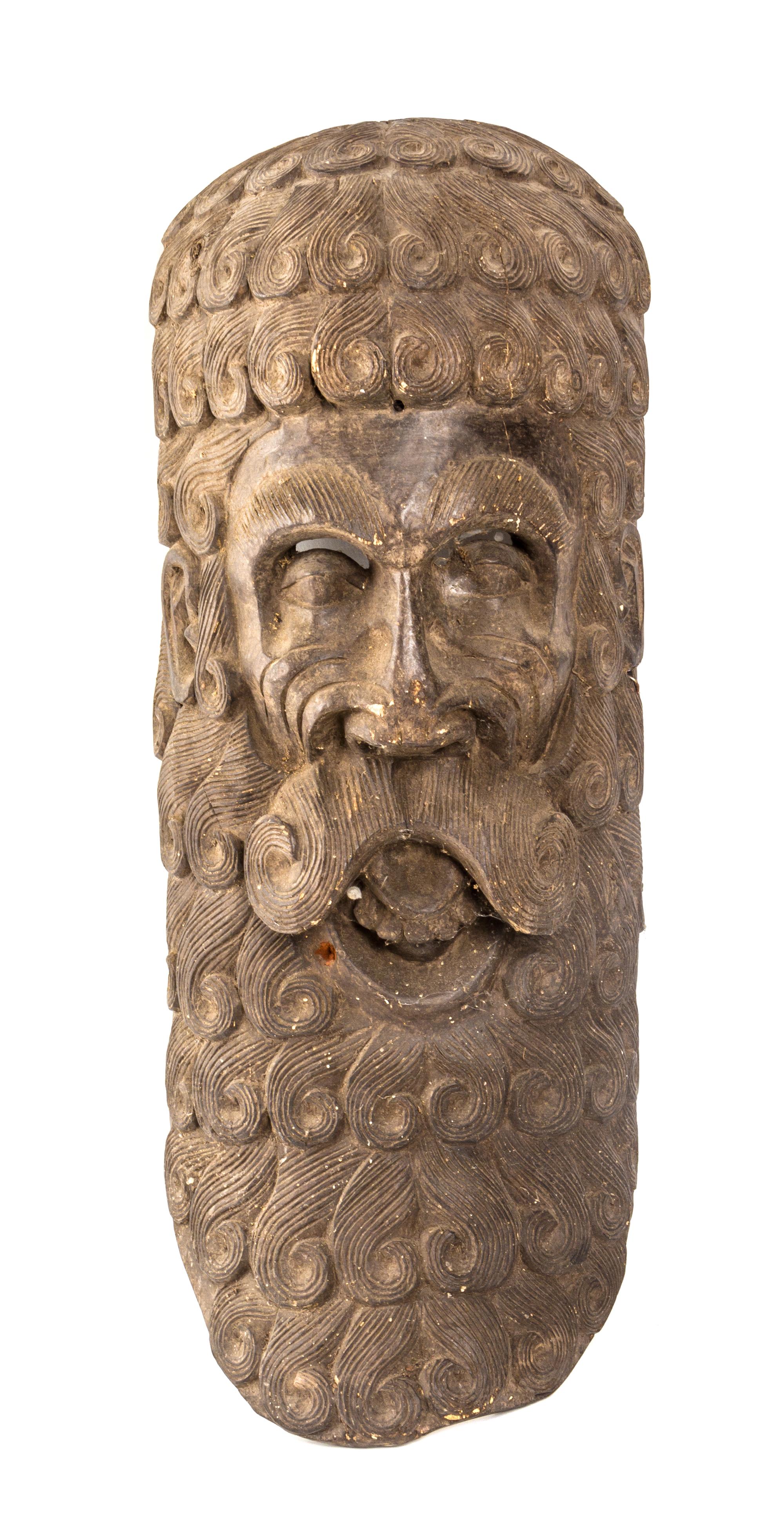 An Italian Carved Wood Mask, Height 25 1/2 inches.