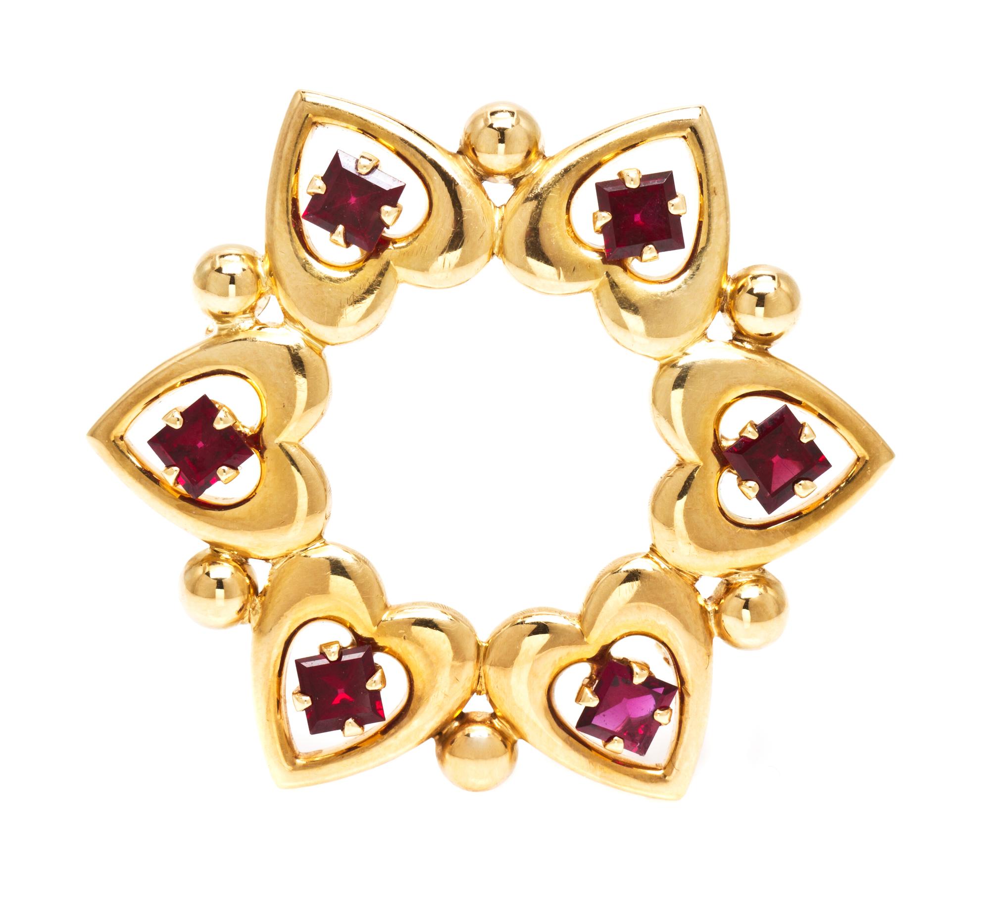 A 14 Karat Yellow Gold and Garnet Brooch, Tiffany & Co., 6.50 dwts.
