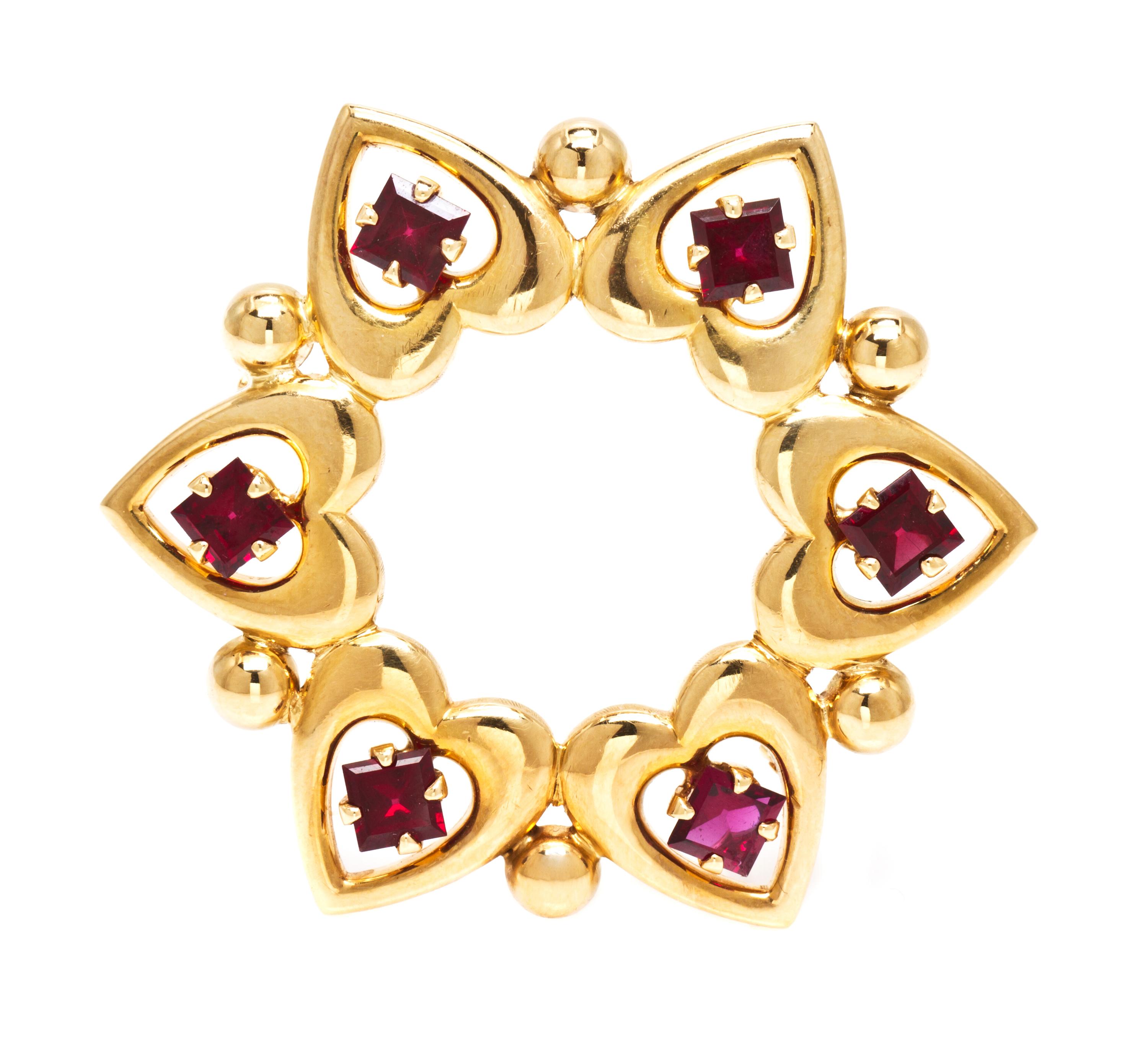 A 14 Karat Yellow Gold and Garnet Brooch, Tiffany & Co., 6.50 dwts.