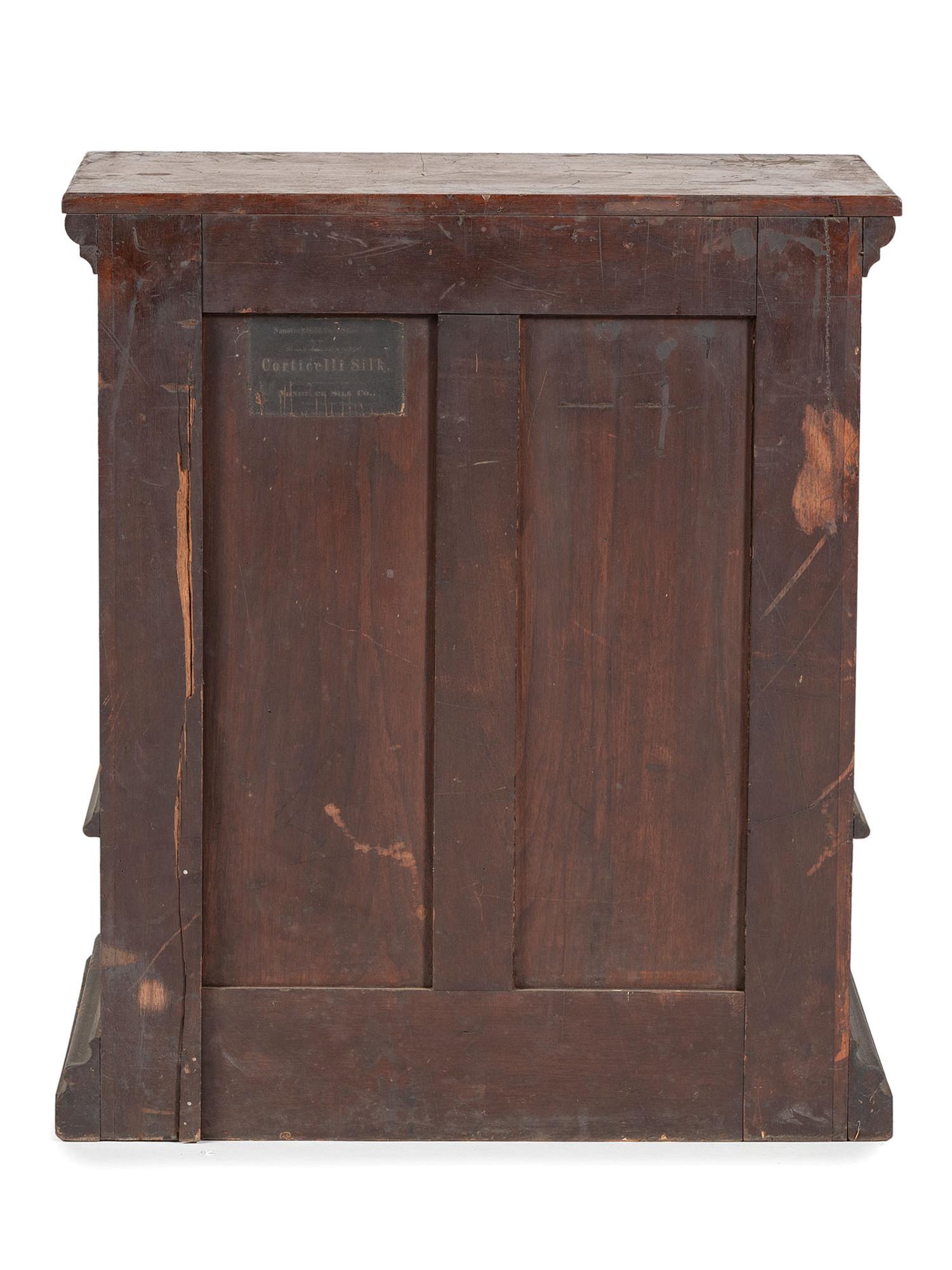 A Nine Drawer Counter Top Spool Cabinet