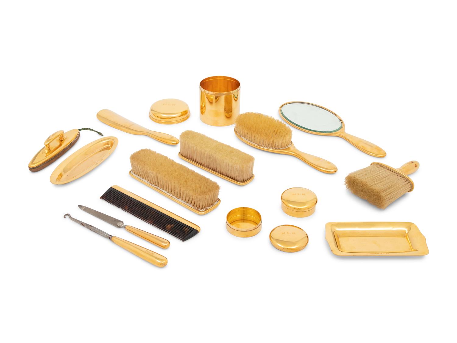A Tiffany and Co. 18-Karat Yellow-Gold Fourteen-Piece Dresser Set