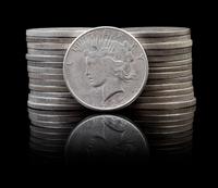 A Group of 27 United States Peace Silver Dollars