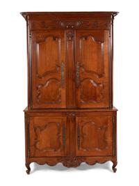 A Louis XV Provincial Cherry Stepback Cupboard