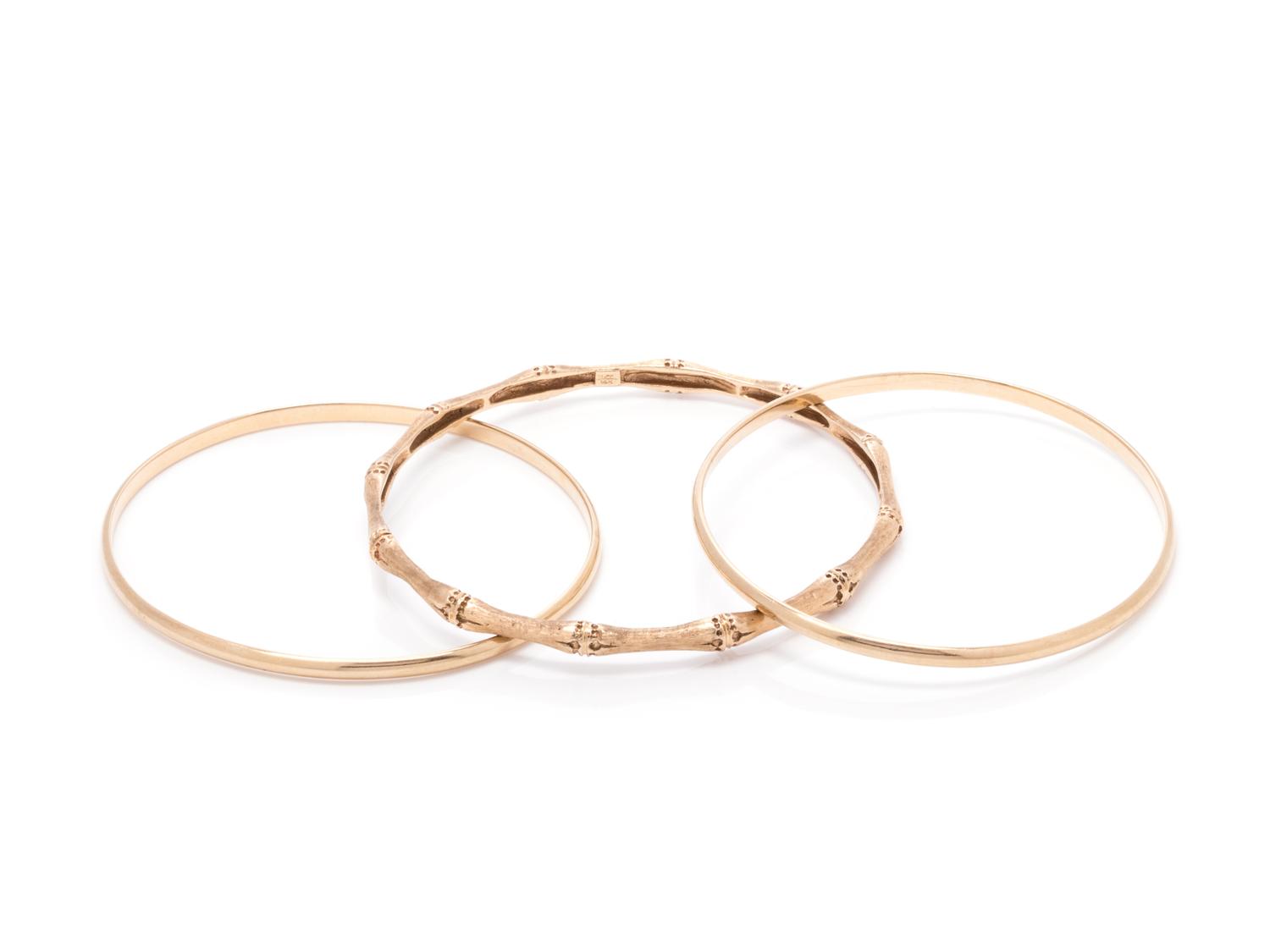 COLLECTION OF YELLOW GOLD BANGLE BRACELETS