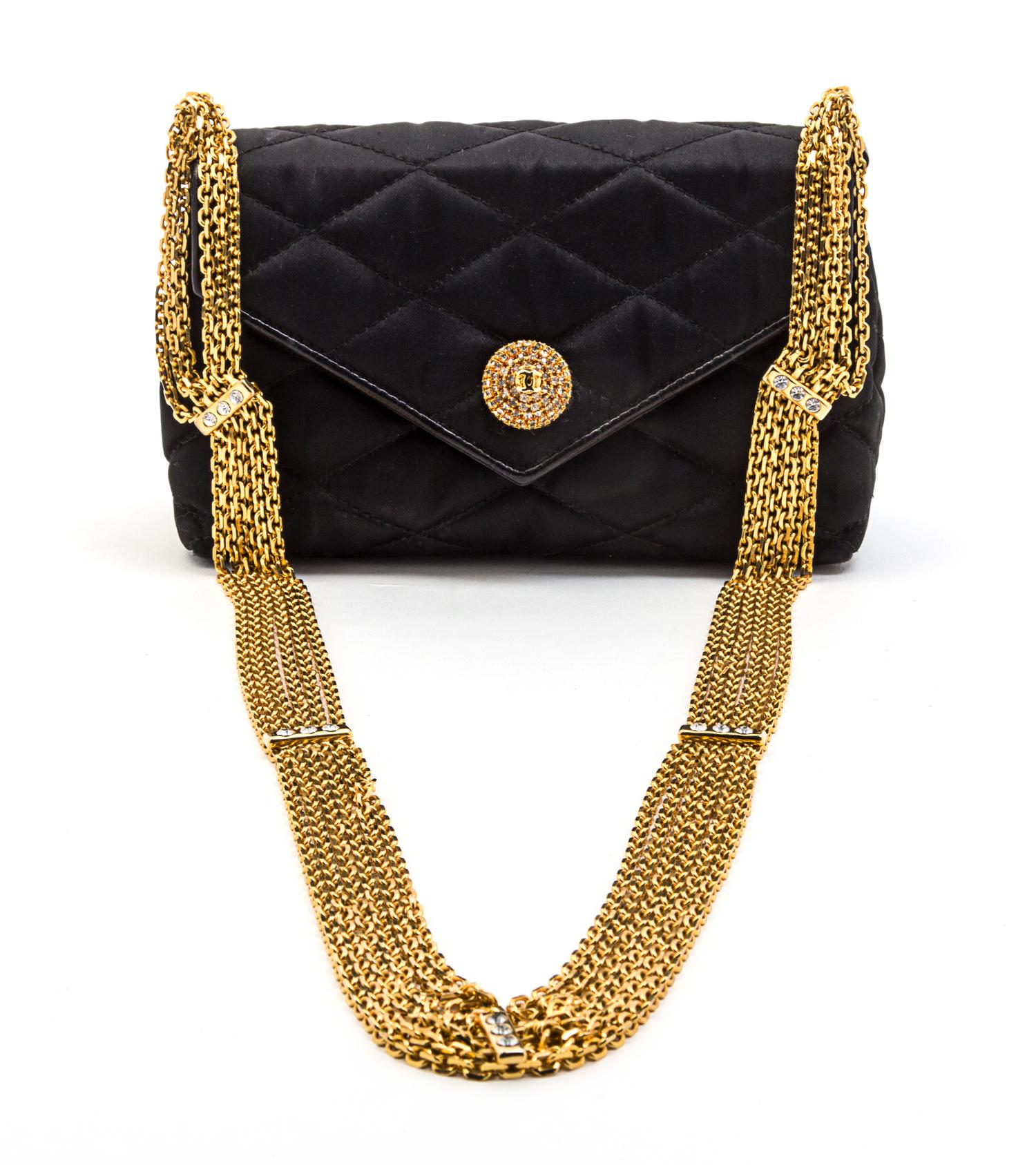 A Chanel Black Satin Quilted Convertible Evening Bag, 6 1/2 x 4 x 2 1/2 inches.