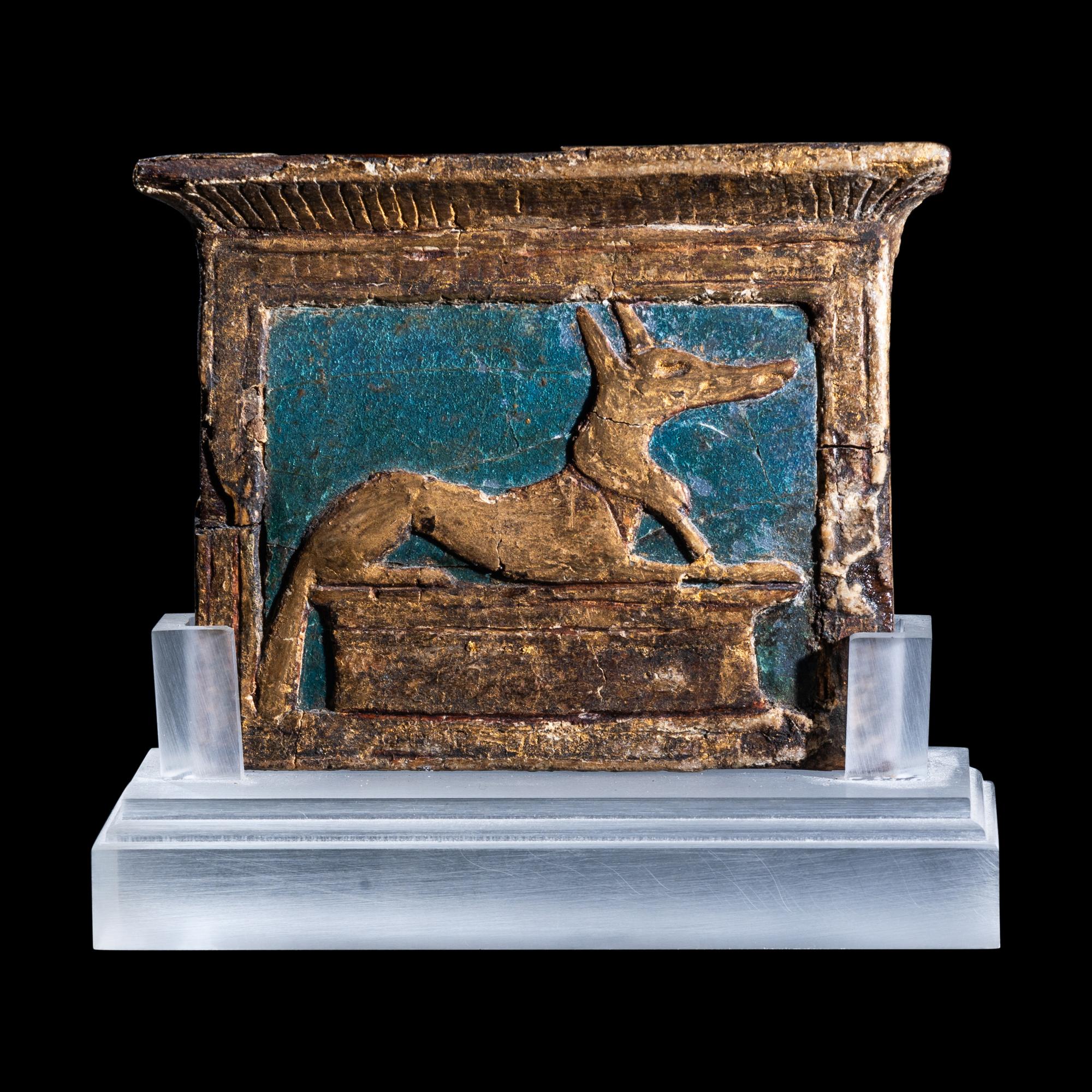 An Egyptian Enamel and Gilt Wood Anubis Pectoral