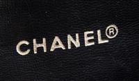A Chanel Navy Quilted Leather Flap Handbag, 11" x 10" x 3".