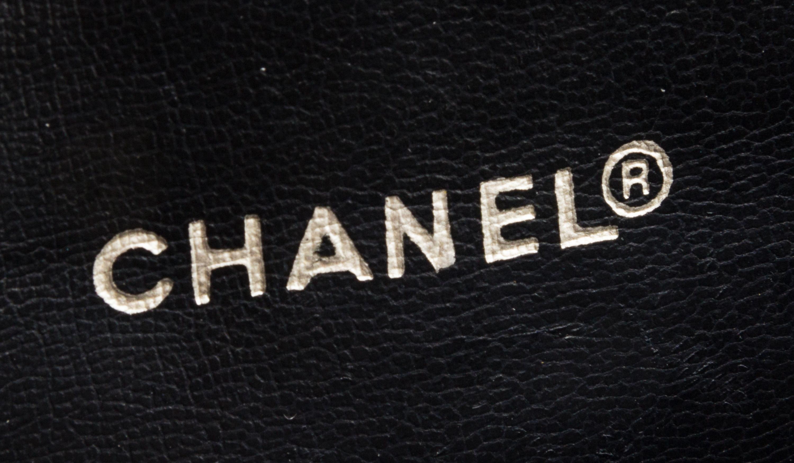 A Chanel Navy Quilted Leather Flap Handbag, 11" x 10" x 3".
