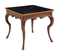 A French Gilt Metal Mounted Parcel Ebonized Mahogany Game Table