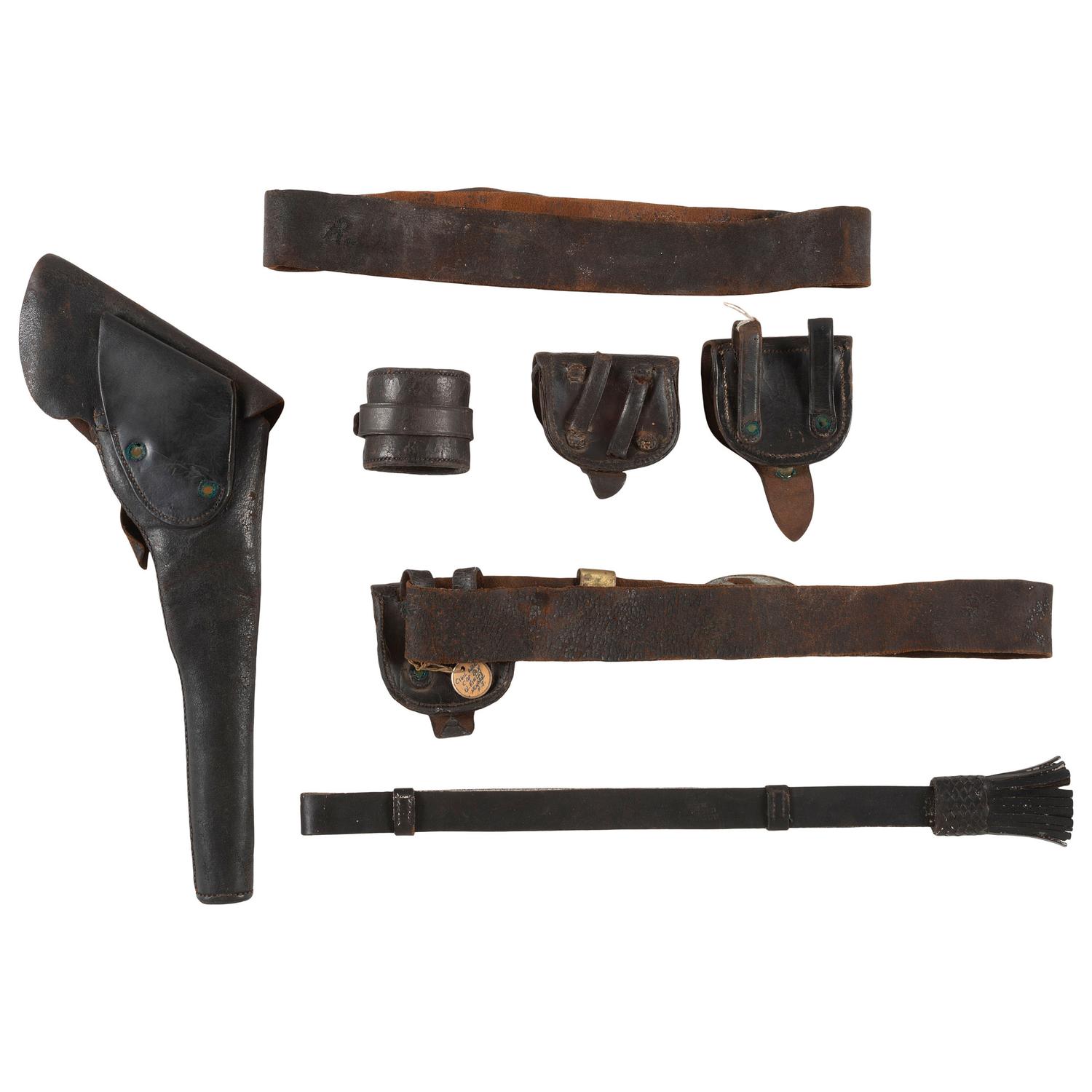 Group of Civil War Era Union Accoutrements: 2 Belts & U.S. Plates, 3 Cap Pouches, a Sword Knot, a Holster & A Carbine Thimble