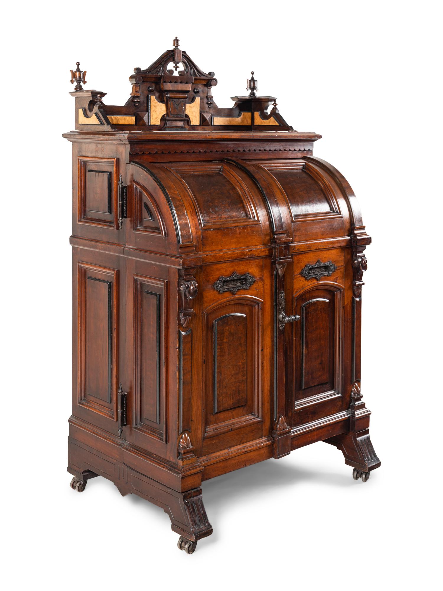 A Victorian Walnut and Bird’s Eye Maple Wooten Patent Desk