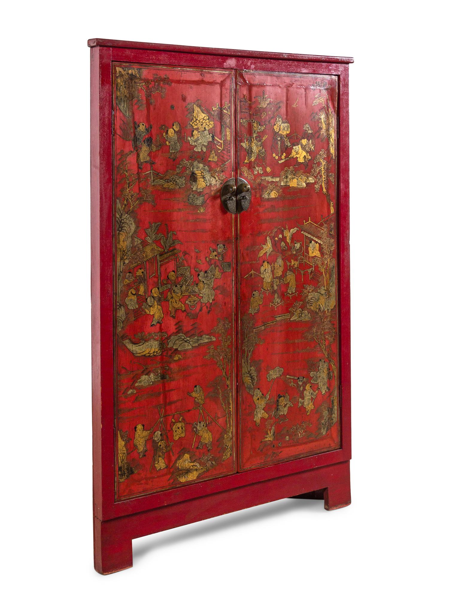 A Chinese Gilt Decorated Red Lacquer Corner Cabinet