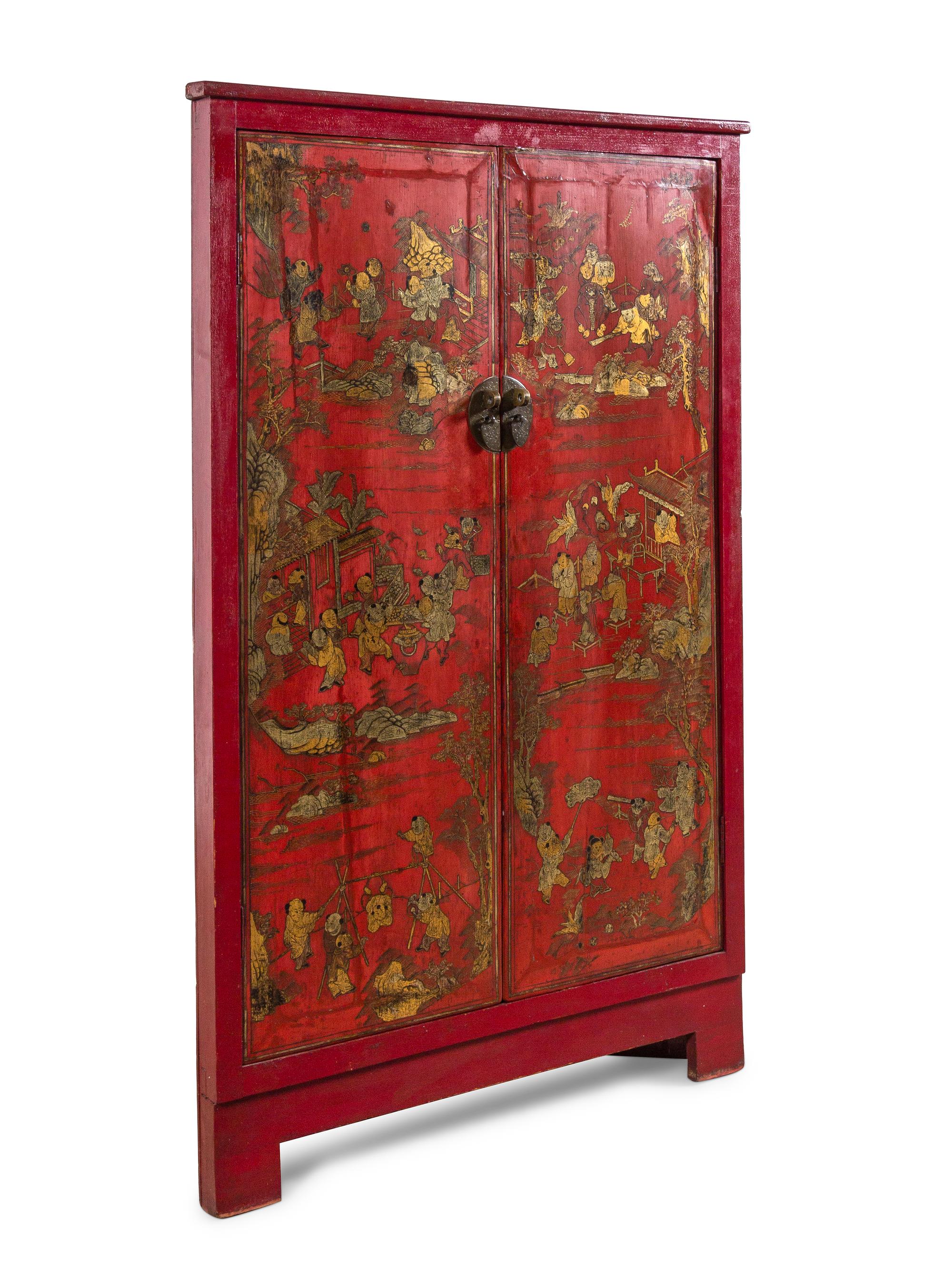 A Chinese Gilt Decorated Red Lacquer Corner Cabinet