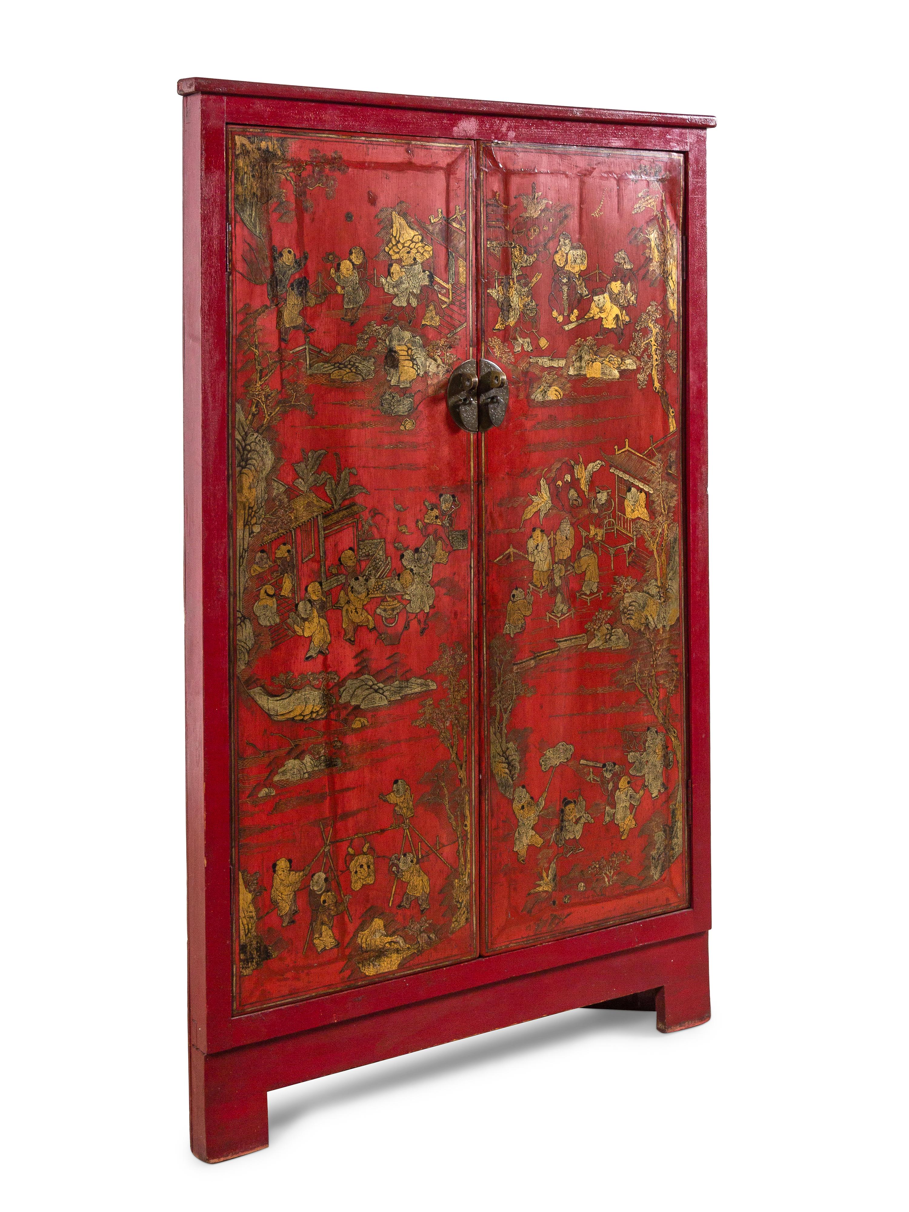 A Chinese Gilt Decorated Red Lacquer Corner Cabinet