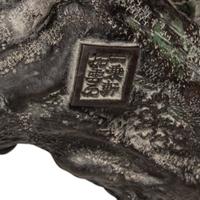 A Japanese Bronze Figural Group of a Hawk Hunting Monkeys