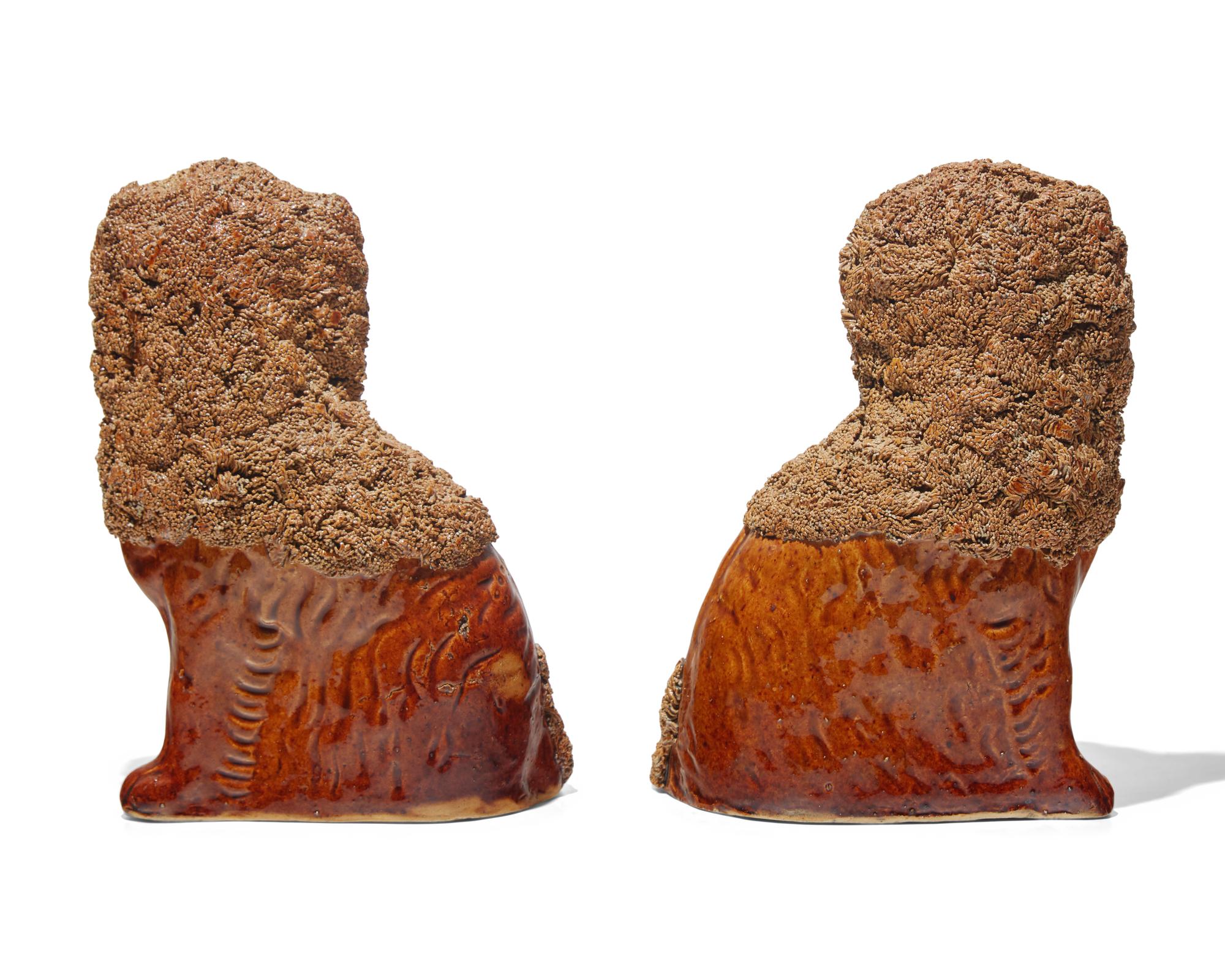 A Scarce Pair of Rockingham Glazed Spaniels