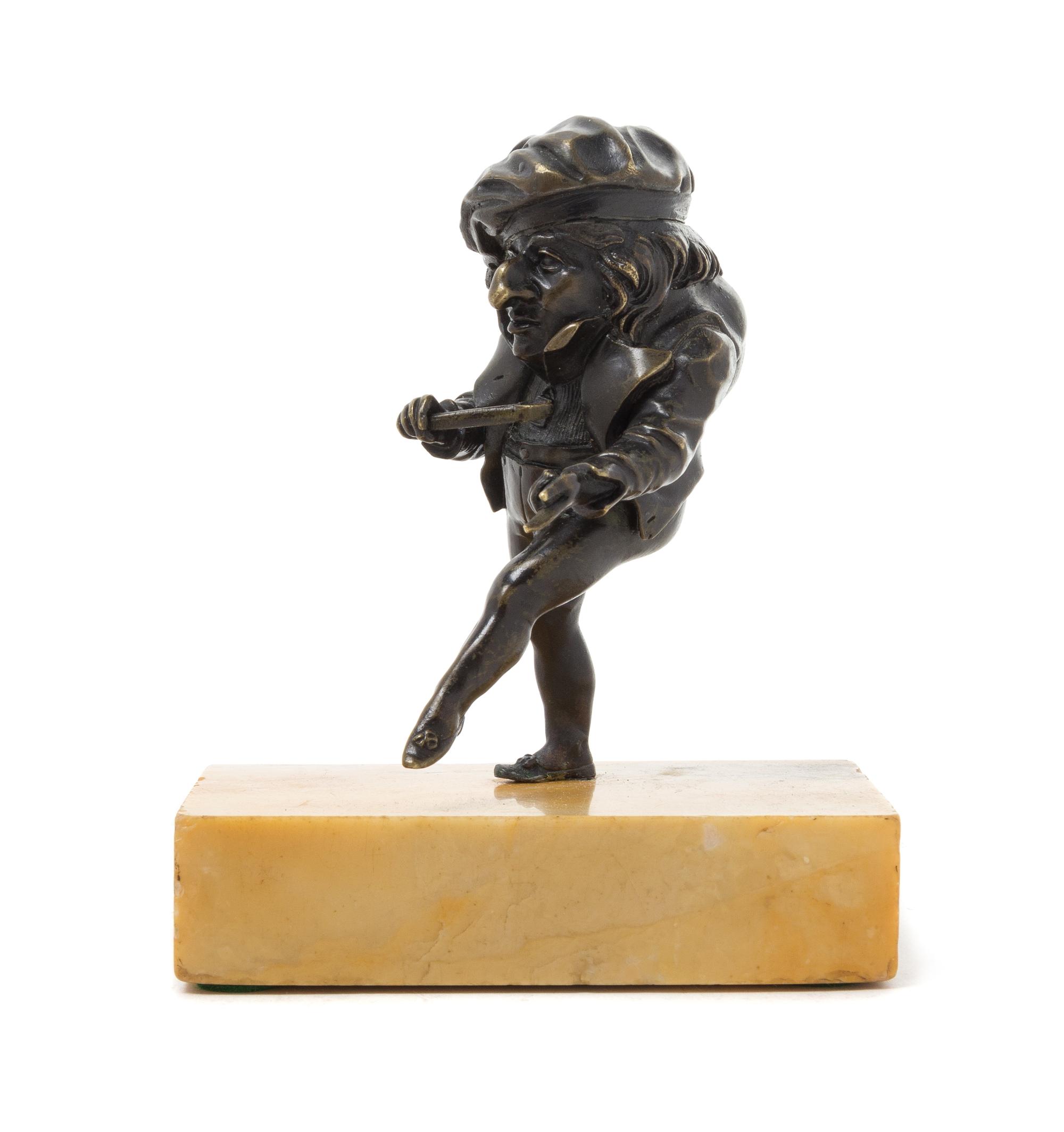 A Continental Bronze Figure of Punch Height 4 1/2 inches.