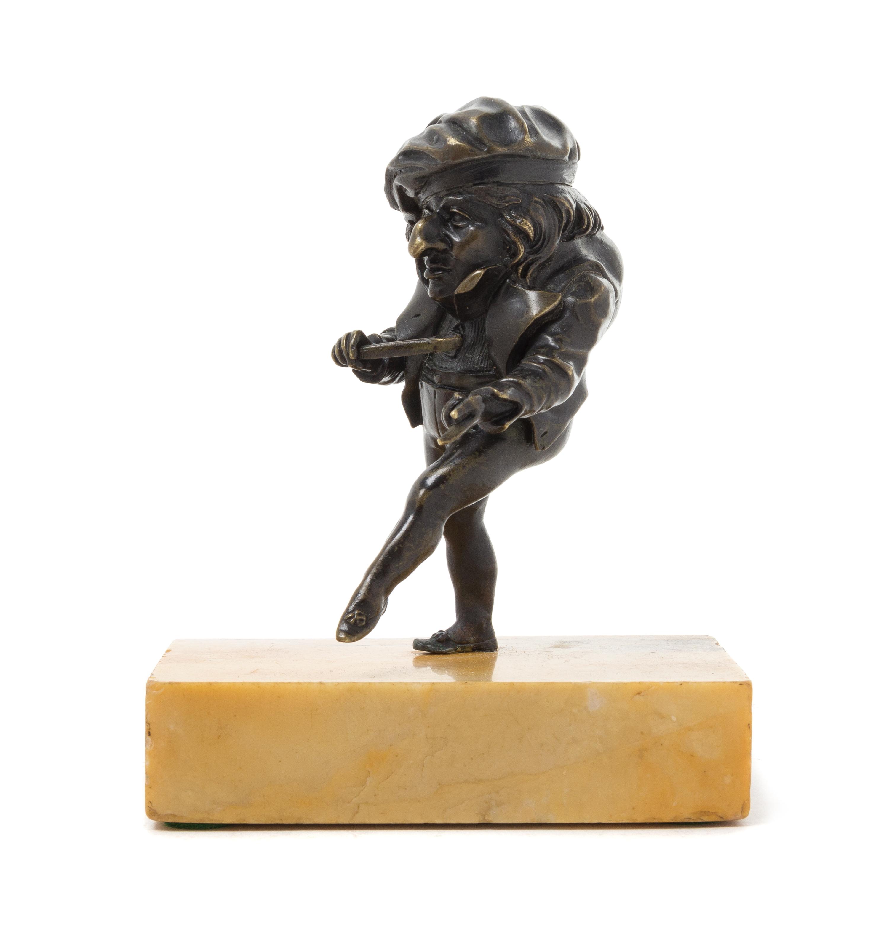 A Continental Bronze Figure of Punch Height 4 1/2 inches.