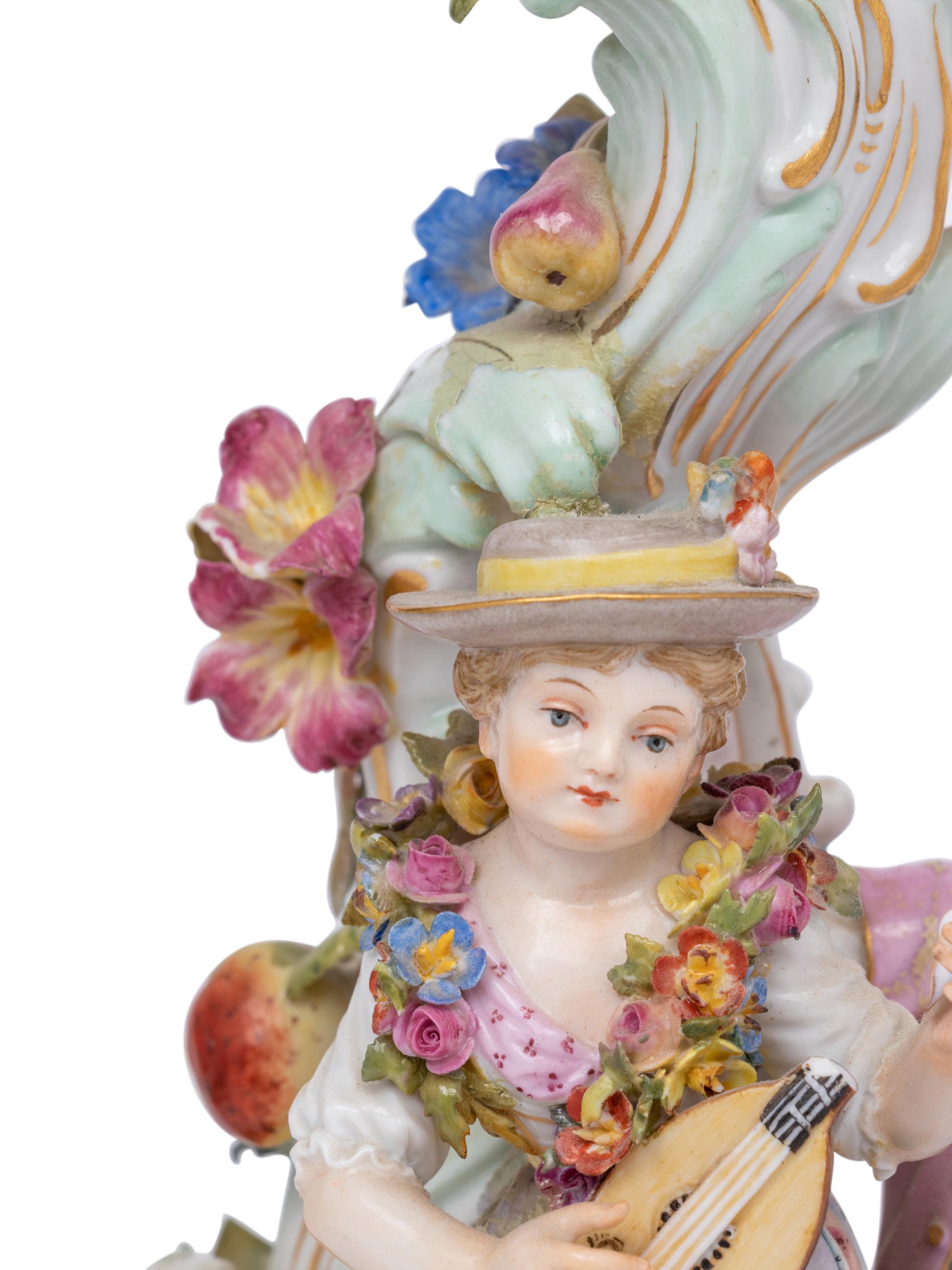 A Pair of Meissen Porcelain Candelabra