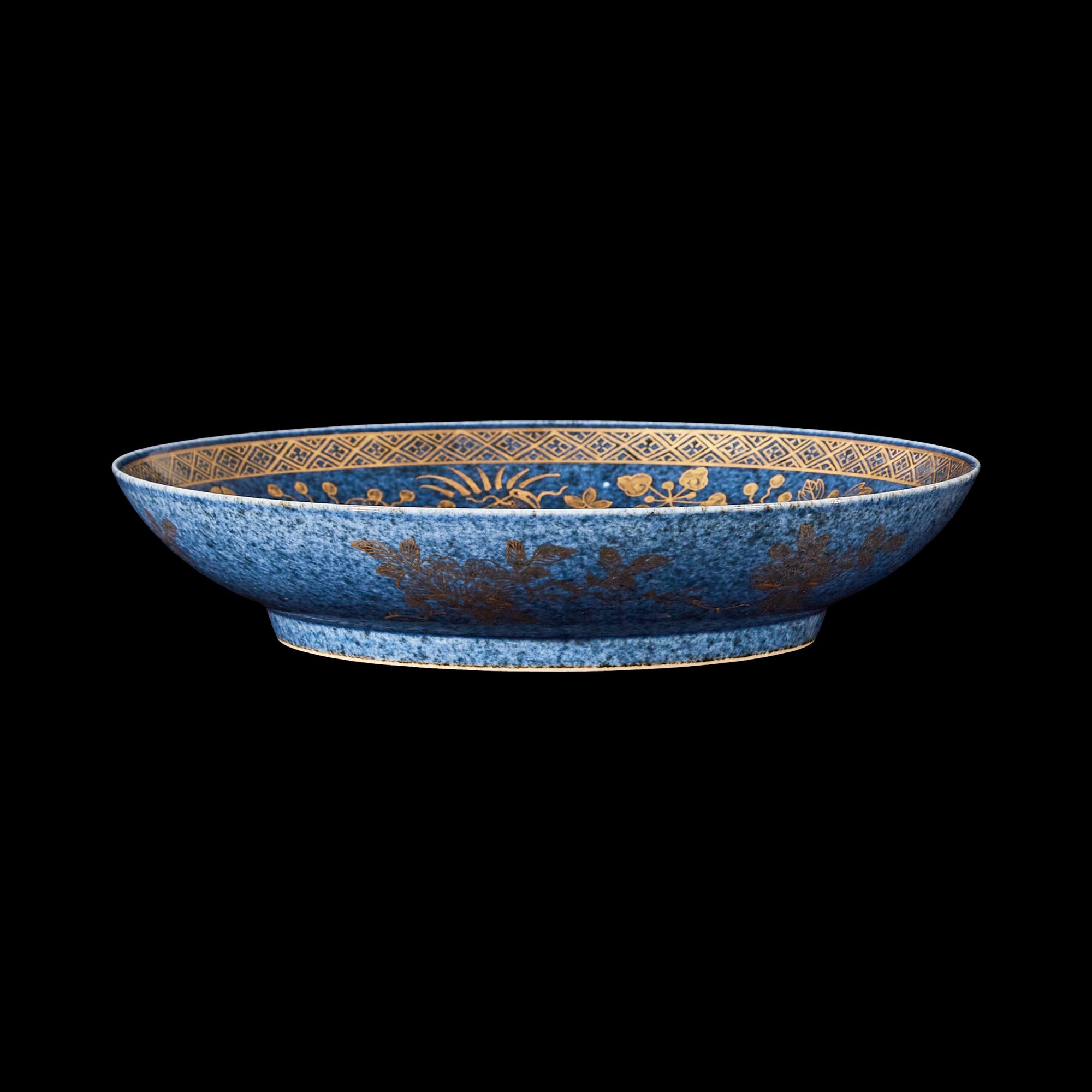 A Gilt Decorated Powder Blue Ground 'Fishes' Dish, 18th Century 清中期 藍地描金魚藻紋賞盤