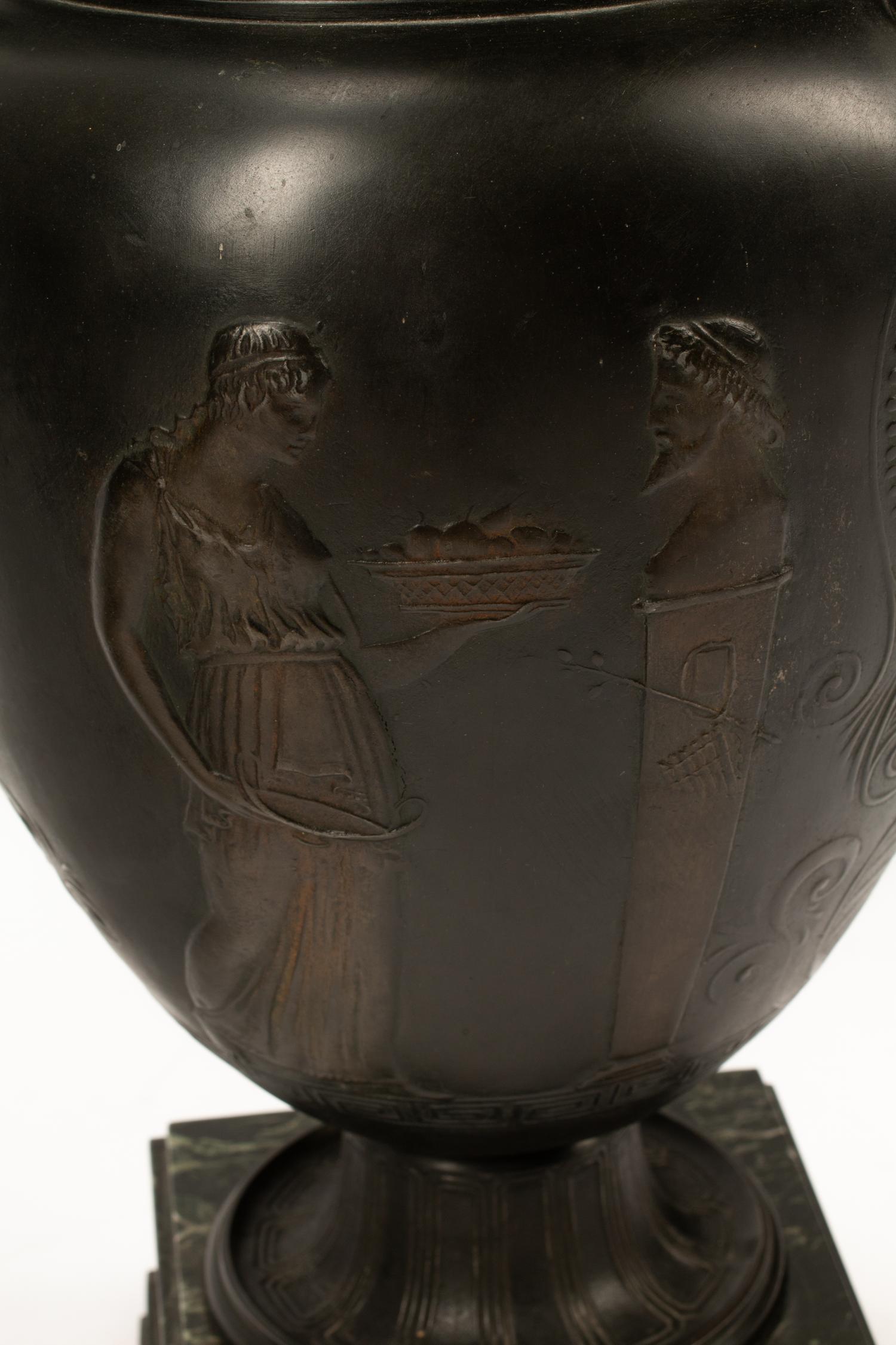 A Pair of Pompeiian Style Bronze Urns
