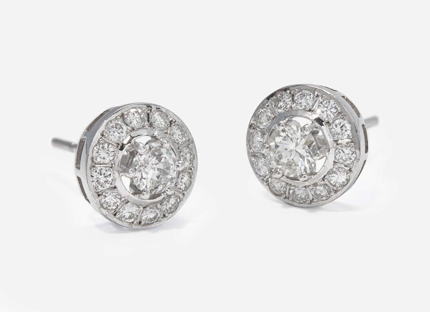 A Pair of 18K White Gold and Diamond Earrings