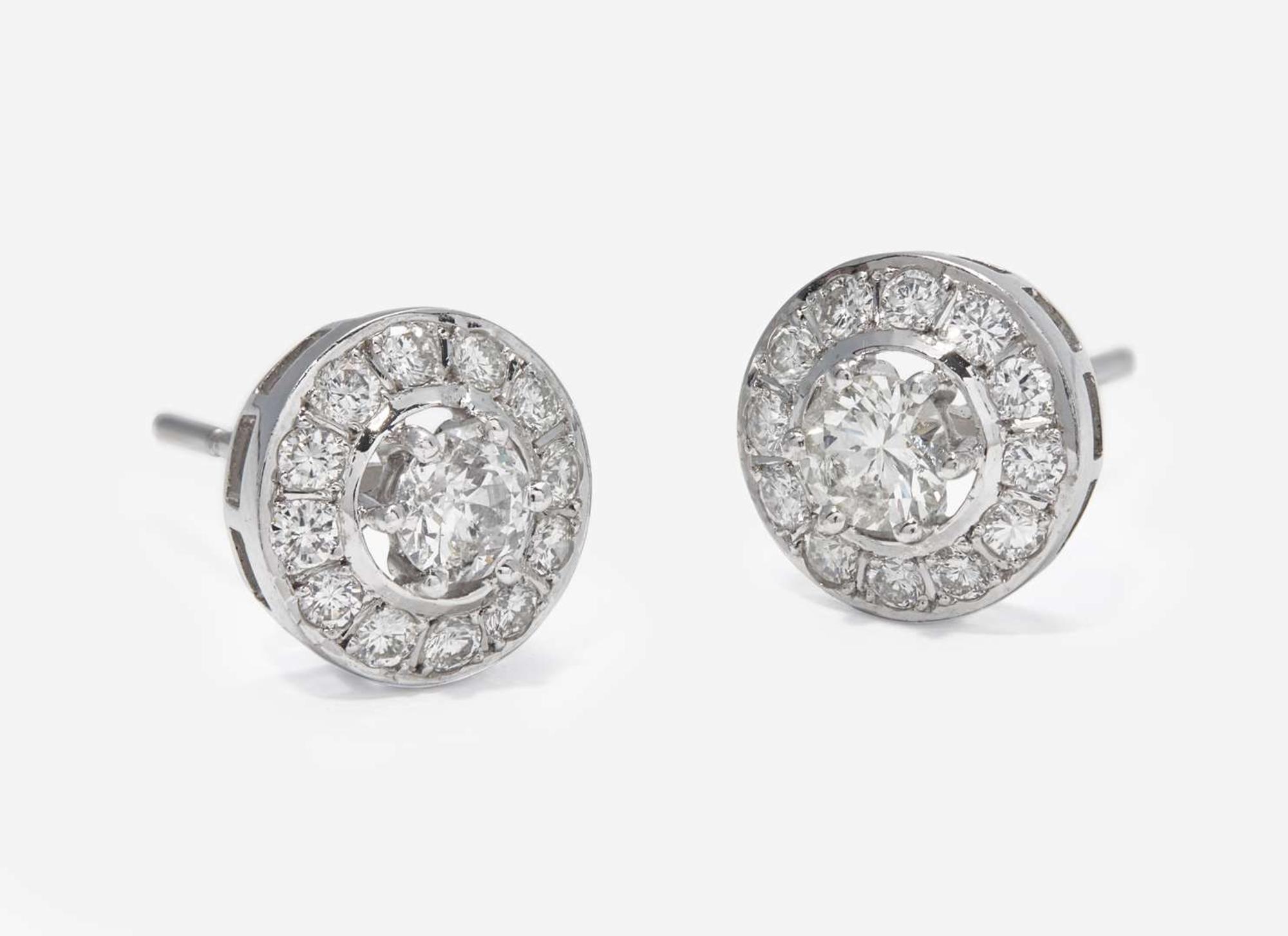 A Pair of 18K White Gold and Diamond Earrings