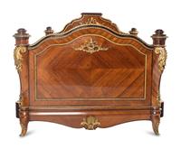 A Louis XV Style Gilt Bronze Mounted Kingwood Bed Frame