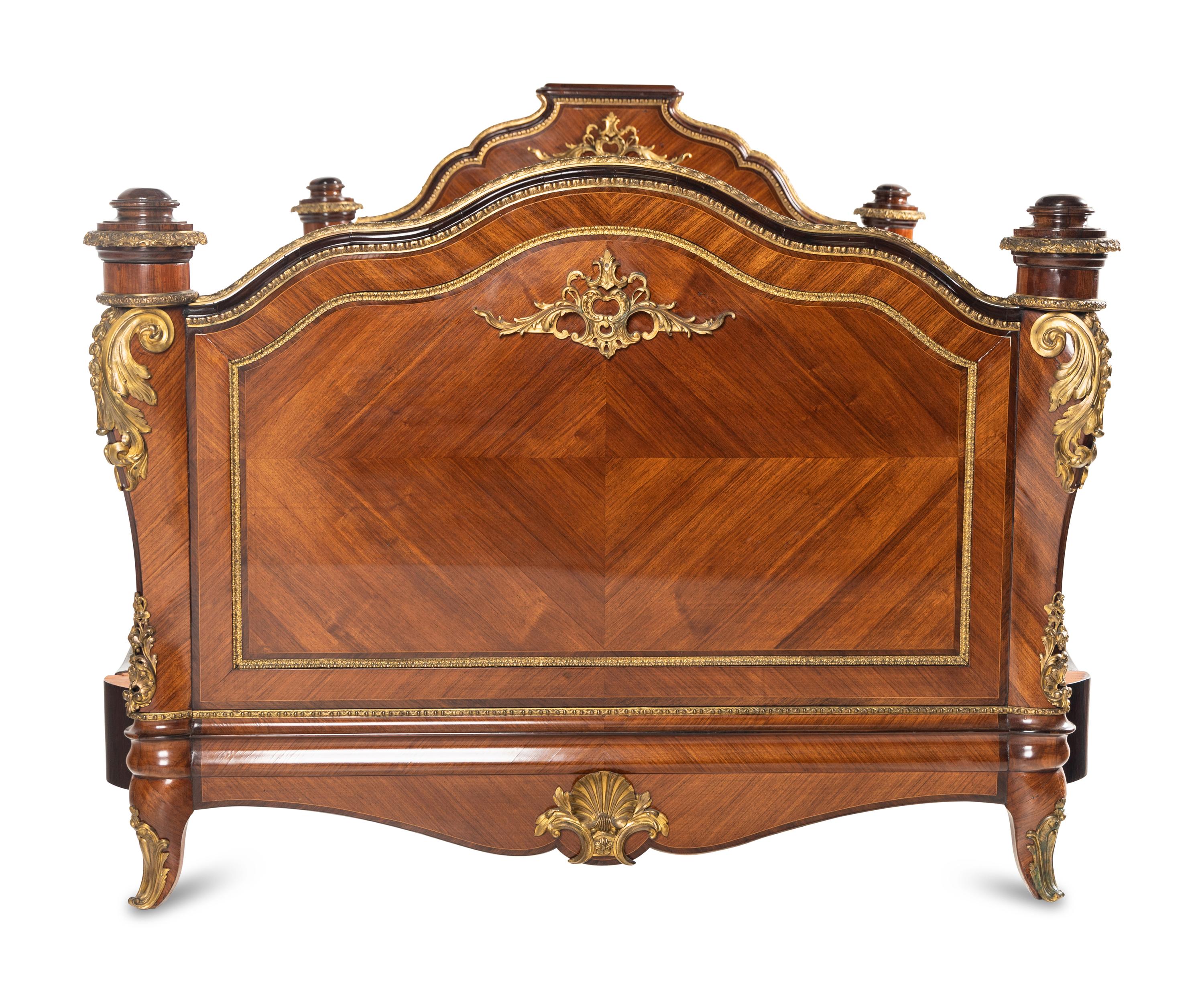 A Louis XV Style Gilt Bronze Mounted Kingwood Bed Frame