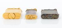 A Group of Three Dunhill Lift-Arm Lighters