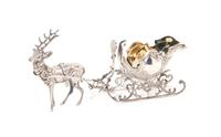 A German Silver Reindeer and Sleigh Set Width overall 9 1/2 inches. — 20TH CENTURY
