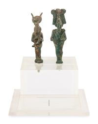 An Egyptian Bronze Osiris and Isis nursing Harpocrates