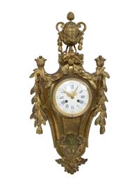 A Louis XVI Style Gilt Bronze Cartel Clock