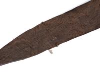 An Aboriginal Wood Spear Thrower (woomera)