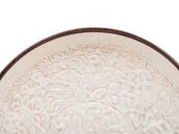 A Chinese Dingyao Style White Glazed Molded Porcelain Bowl
