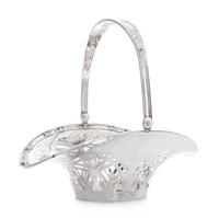 An American Silver Fruit Basket, Grogan Company, Pittsburgh, PA, with a swing handle, pierced sides and engraved foliate scrolls.