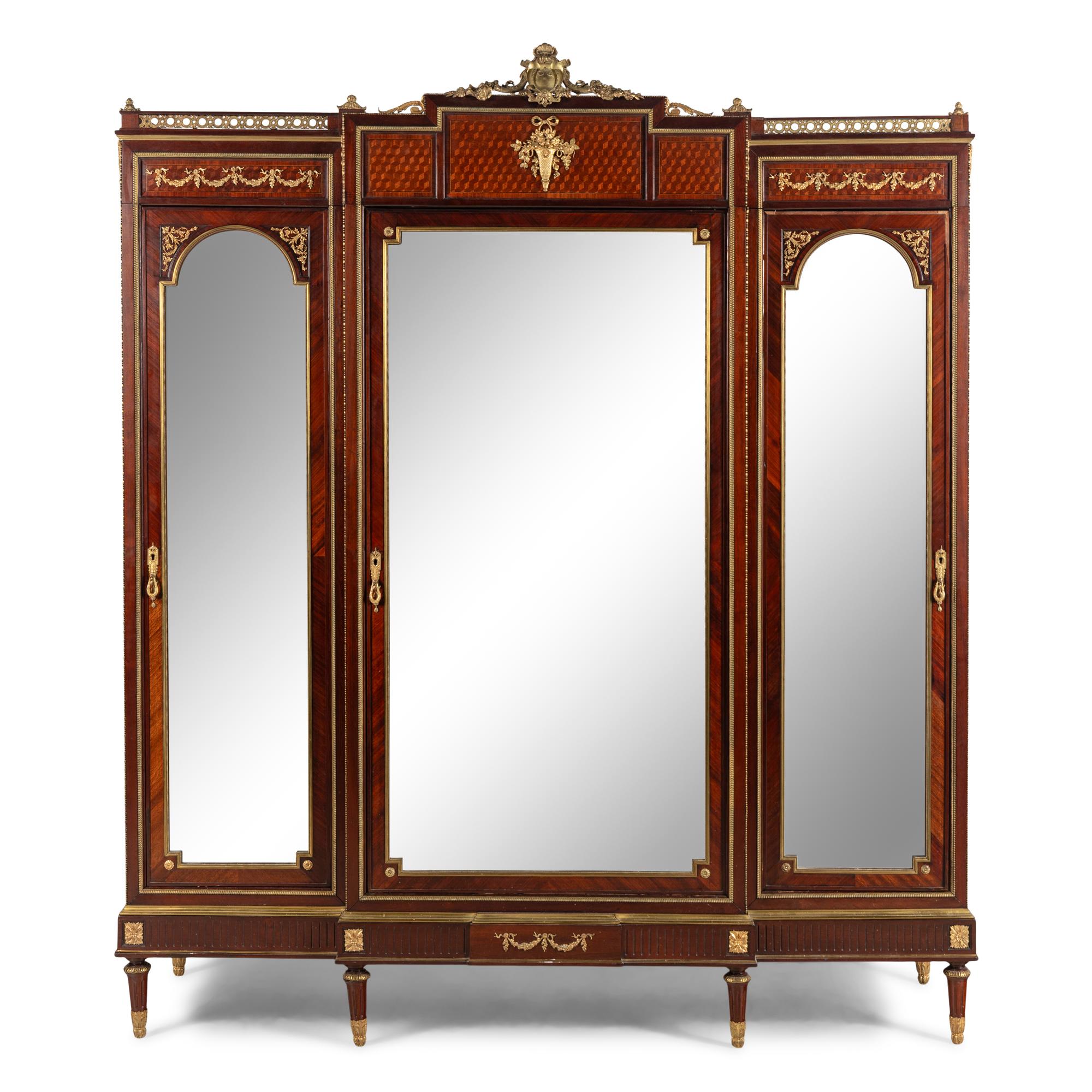 A Louis XVI Style Mahogany, Parquetry and Gilt Bronze Mounted Dressing Cabinet