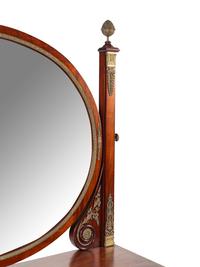 An Empire Style Gilt Bronze Mounted Mahogany Chest of Drawers with Dressing Mirror