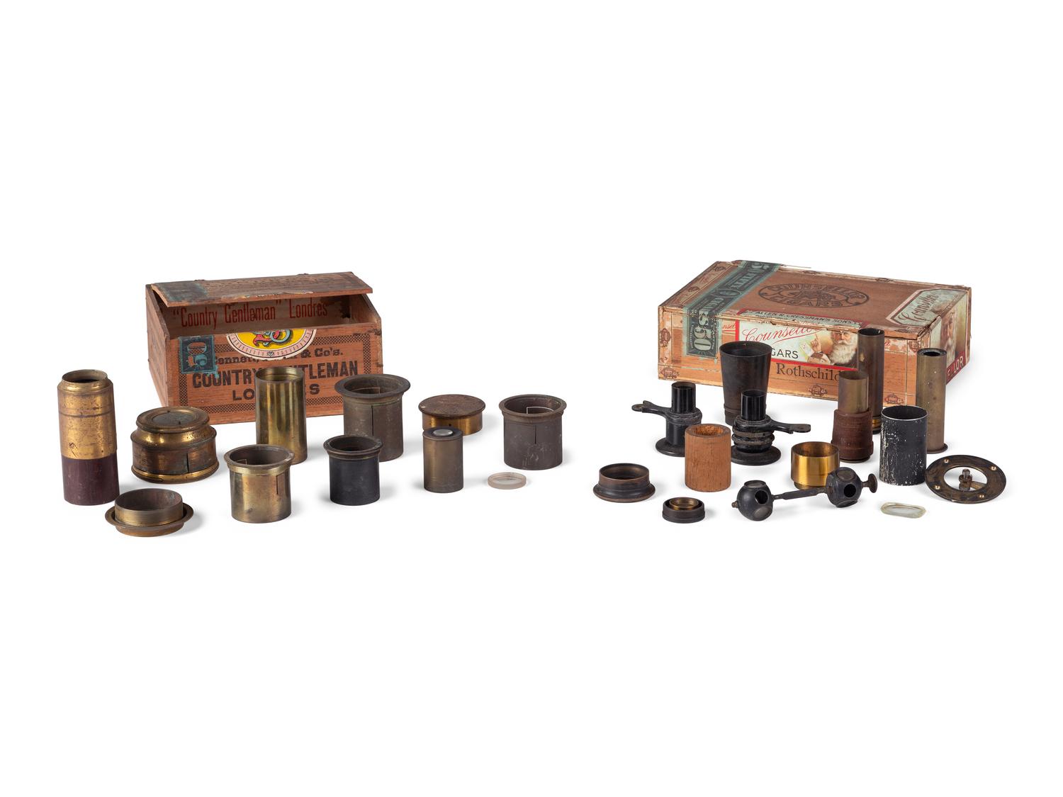 A group of 25 telescope parts highlighted by "H. Fitz NY" eyepiece, found in the workshop of George W. Fitz, Peconic, New York.