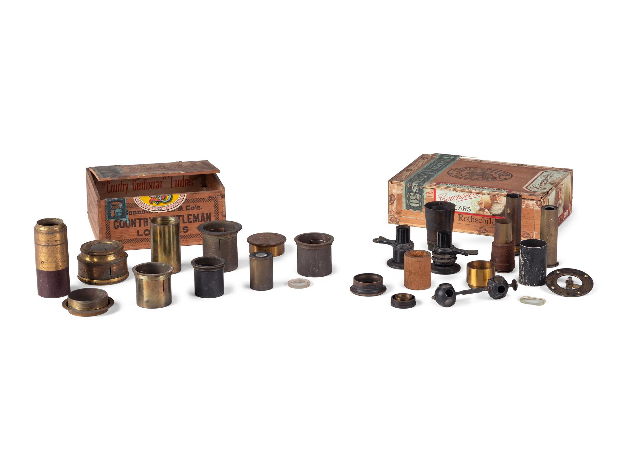 A group of 25 telescope parts highlighted by "H. Fitz NY" eyepiece, found in the workshop of George W. Fitz, Peconic, New York.